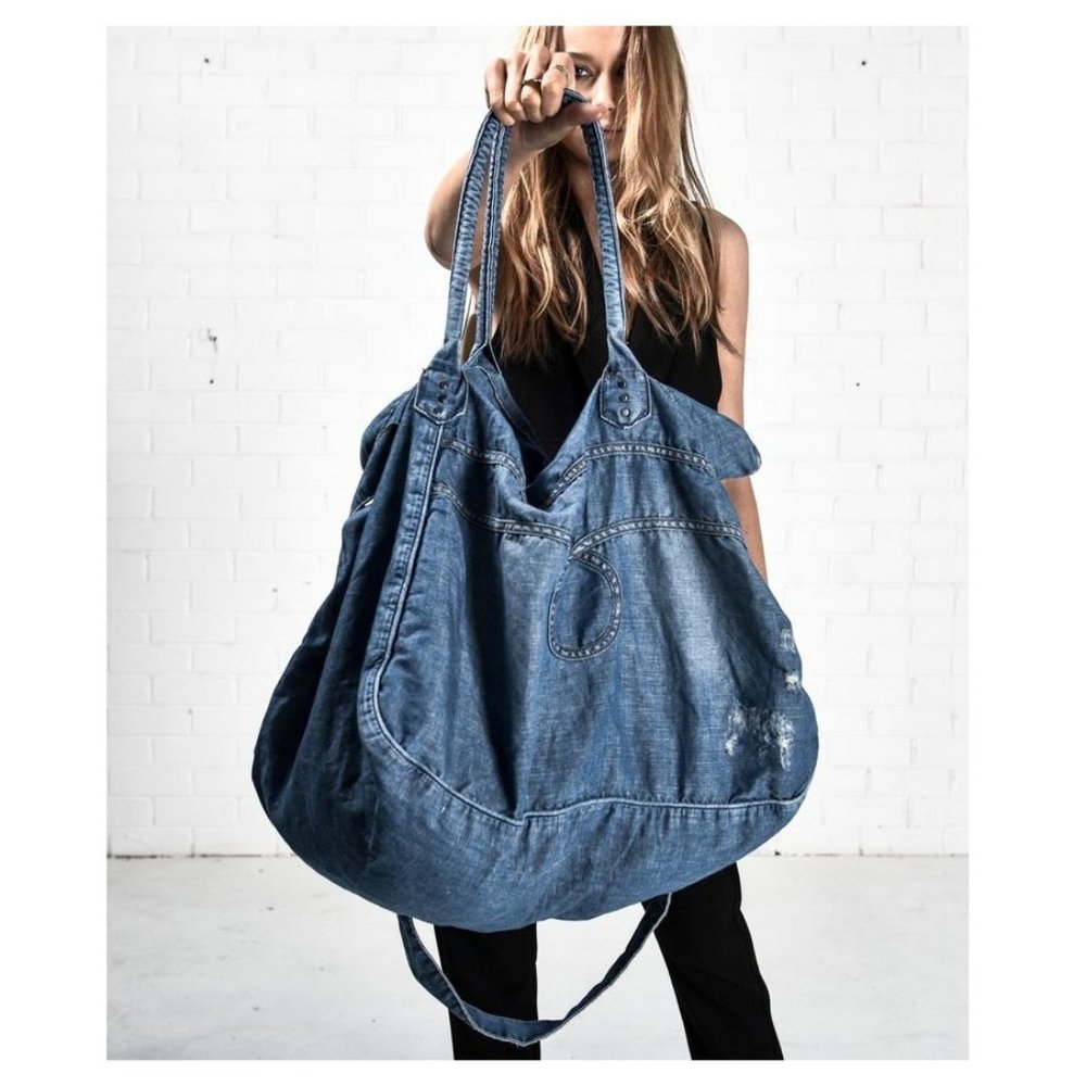 Free People One Teaspoon Faded Denim Overnighter Bag